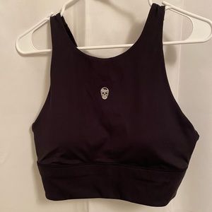 Black work out top, size medium, skull detail on front